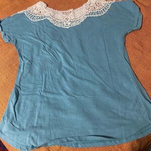 Women’s light turquoise top with lace inset